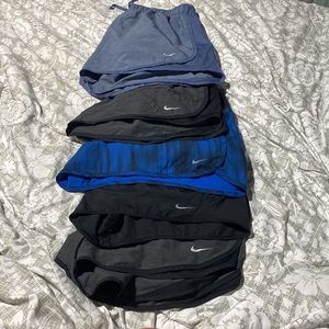 5 pairs of gently worn Nike shorts for sale.